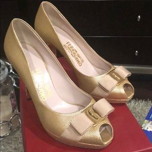 Ferragamo peep-toe pumps.